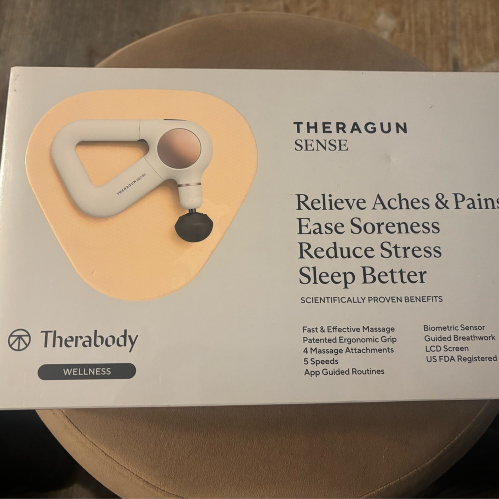 Therabody Device in White and Gray